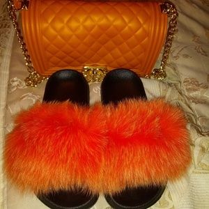 Orange fur slides and matching purse